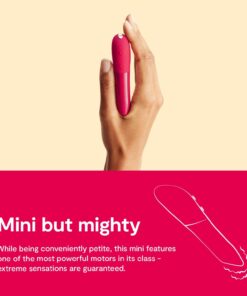 Hand holding a cherry Red colored We-Vibe Tango X bullet vibrator with text saying Mini but MightyÂ 