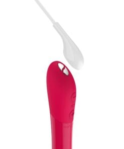 Closeup of a cherry red colored We-Vibe Tango X bullet vibrator charging cable and port