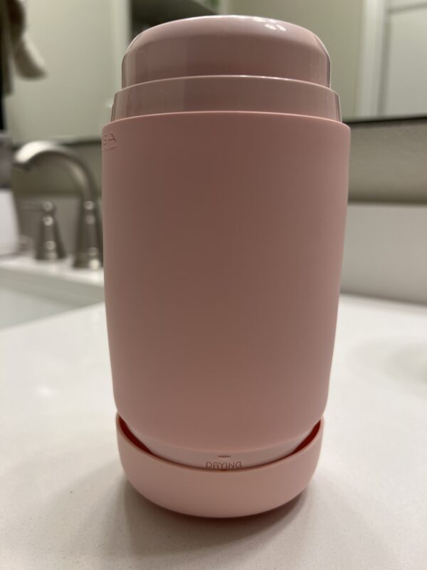 The Strawberry Pink Tenga Puffy propped up to dry.