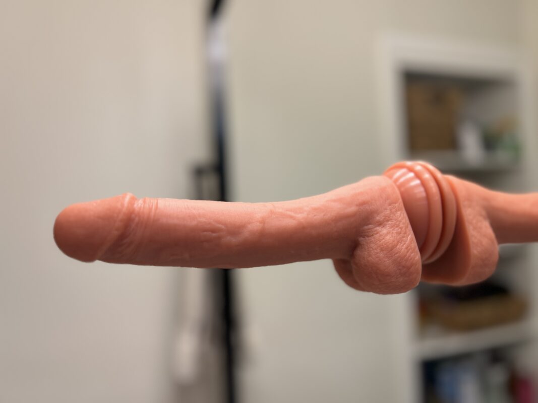 Fukena dildo suction cup in action (shown on mirror).