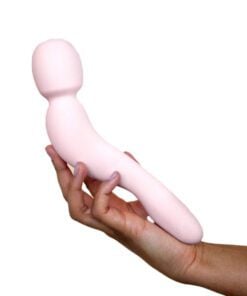 Handing holding Dame Com Wand Vibrator in Quartz