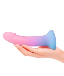 Dildolls Utopia dildo being held by a hand