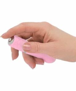 Hand pushing the button of a pink Pillow Talk Flirty bullet vibrator