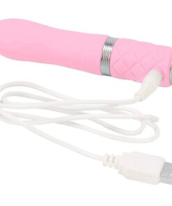 Pink Pillow Talk Flirty bullet vibrator with it's USB charging cable on a white background