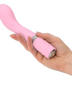 Hand holding a Pillow Talk Sassy g-spot vibrator