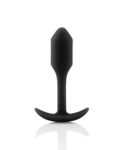 Small sized, black Snug Plug butt plug covered withÂ  silicone standing straight up on a white background