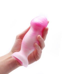 Hand holding Uberrime Sensi Vaginal Plug Pink Pearl