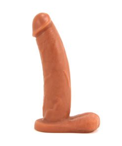 Caramel colored Vixen Bandit dual density,Â  platinum silicone dildo standing straight upÂ on a white background