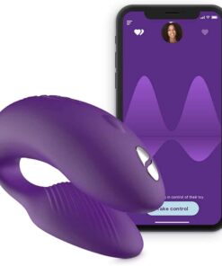 Purple We-Vibe Chorus couples vibrator with a phone showing the bluetooth and app controlÂ 