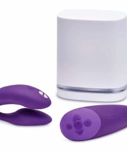 Purple We-Vibe Chorus couples vibrator with the remote control and white charging container