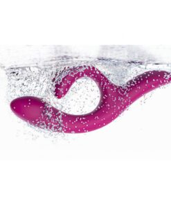 Purple We-Vibe Nova 2 rabbit and g-spot vibrator in water showing that it is waterproof